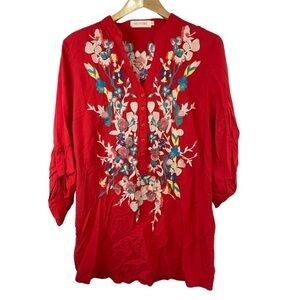 Solitaire tunic top in bright orange and embroidered. Very vibrant and soft.